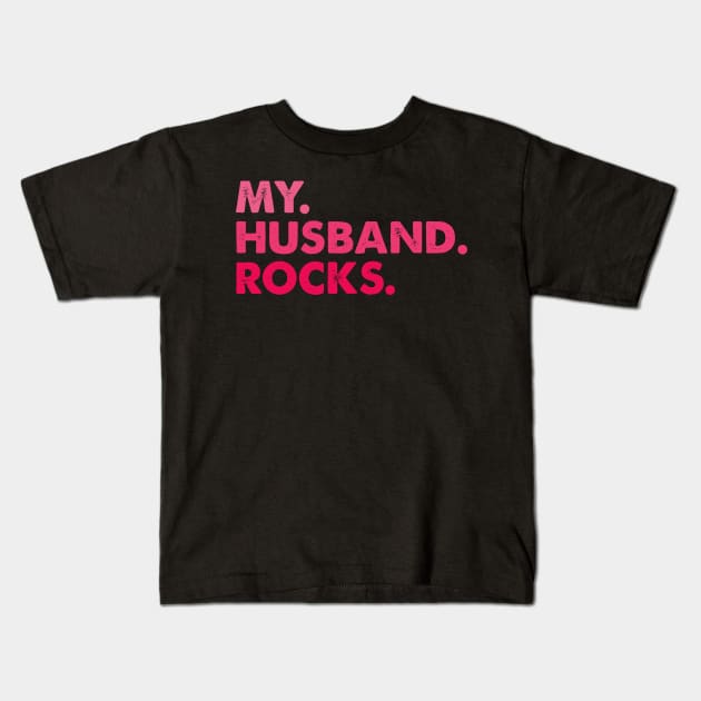 My husband rocks. Kids T-Shirt by MadebyTigger